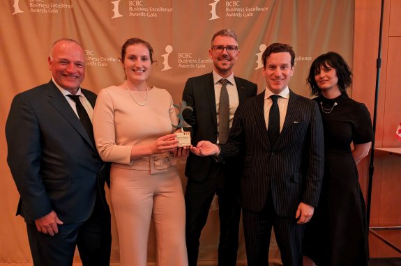 Group of Umicore Canada employees pose at BCBC gala with award